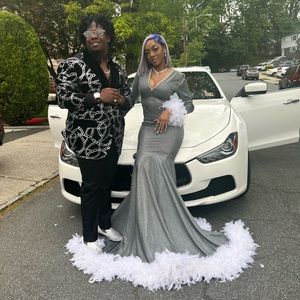 A silver sparkly prom dress